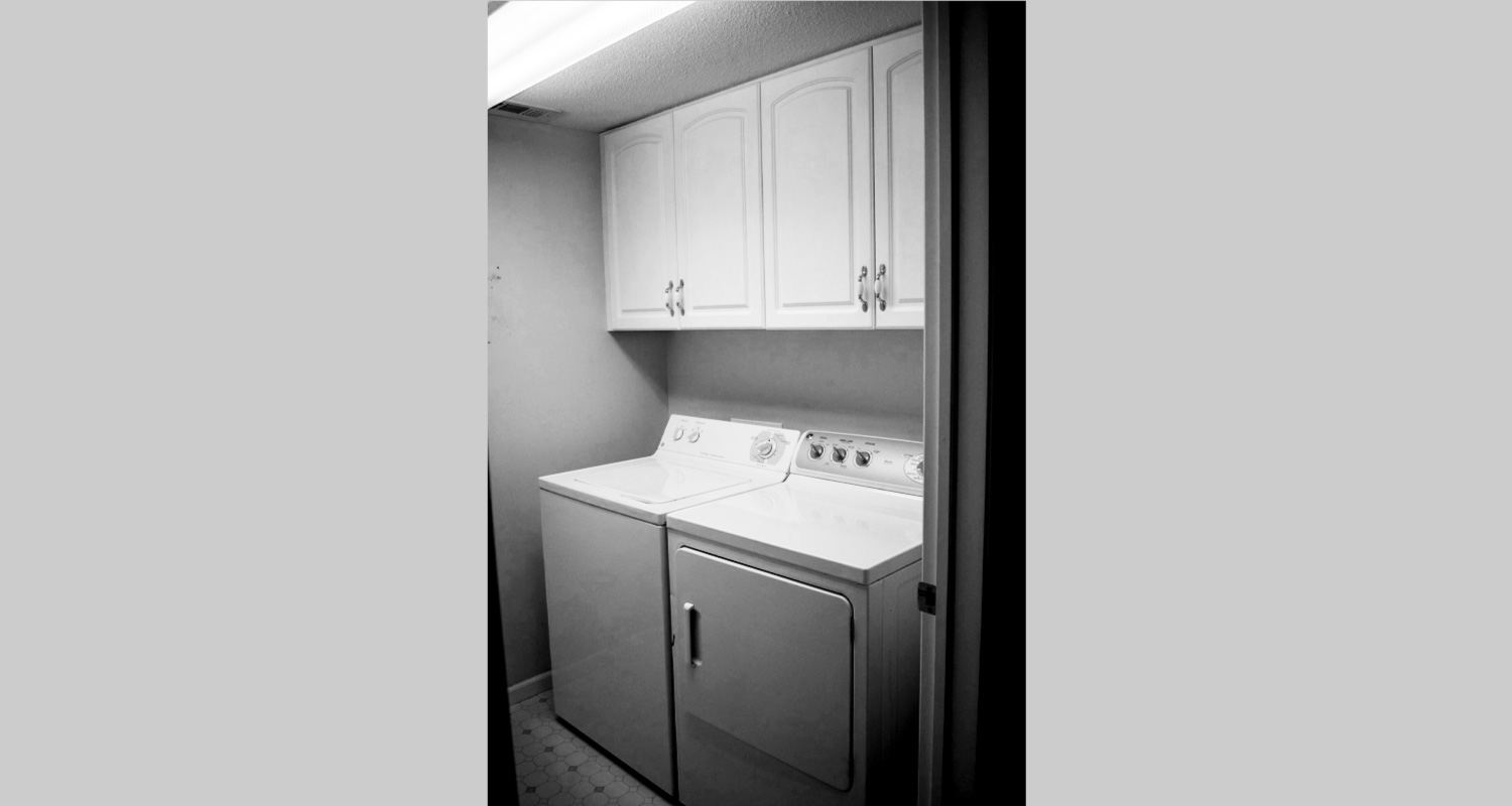 In-unit washer and dryer in laundry room